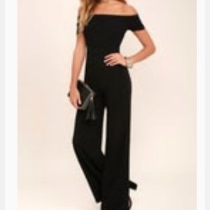 Black long pan jump suit off the shoulder